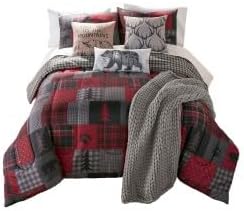 Plaid bedding set with red, gray, and white colors on a white background