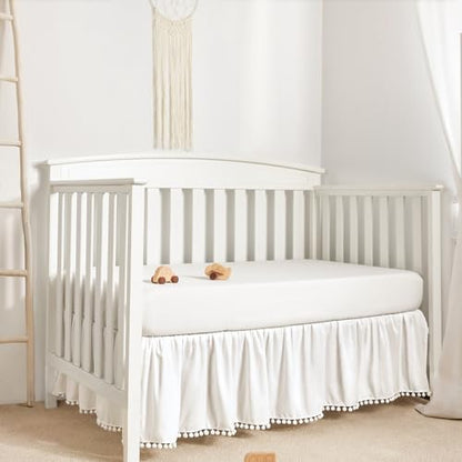 TILLYOU Baby Crib Skirt Girls Boys, Ruffled Bed Skirt with Pompoms, 28”x 52”, 14'' Drop, White