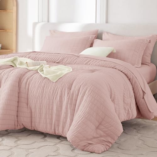 MUXHOMO 7 Pieces Oversized King Comforter Set, Seersucker Bed in a Bag Oversized King Size, All Season Luxury Bedding Set with Comforter, Flat Sheet, Fitted Sheet, Pillowcases & Shams, Rose Gold