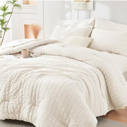 HYMOKEGE Ivory Oversized King Comforter Set Seersucker 7 Pieces, All Season Luxury Bed in a Bag for Bedroom, Bedding Set with Comforter, Sheets, Pillowcases & Shams