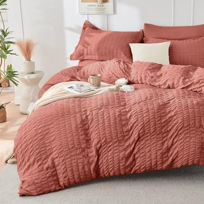 HYMOKEGE Coral Oversized Queen Comforter Set Seersucker 7 Pieces, All Season Luxury Bed in a Bag for Bedroom, Bedding Set with Comforter, Sheets, Pillowcases & Shams