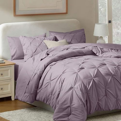 Nestl 9 Piece Full Comforter Set – Dusty Purple Pinch Pleated Bed in a Bag – Complete Full Size Bedding Set with Sheets, Set of 2 Cooling Pillows, Pillowcases and Shams