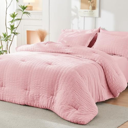 HYMOKEGE Pink Oversized King Comforter Set Seersucker 7 Pieces, All Season Luxury Bed in a Bag for Bedroom, Bedding Set with Comforter, Sheets, Pillowcases & Shams