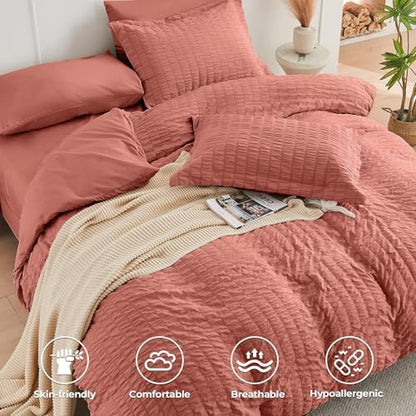 HYMOKEGE Coral Oversized King Comforter Set Seersucker 7 Pieces, All Season Luxury Bed in a Bag for Bedroom, Bedding Set with Comforter, Sheets, Pillowcases & Shams