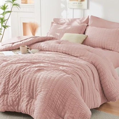 HYMOKEGE Rose Gold Oversized Queen Comforter Set Seersucker 7 Pieces, All Season Luxury Bed in a Bag for Bedroom, Bedding Set with Comforter, Sheets, Pillowcases & Shams