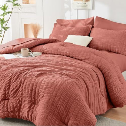 HYMOKEGE Coral Oversized King Comforter Set Seersucker 7 Pieces, All Season Luxury Bed in a Bag for Bedroom, Bedding Set with Comforter, Sheets, Pillowcases & Shams
