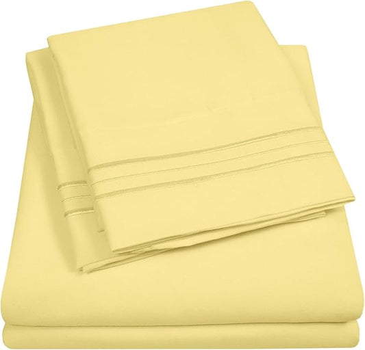 Queen Size Sheet Set with Built-in Sheet Straps - Deep Pocket Fitted Sheet, Flat Sheet & Pillowcases - Soft, Wrinkle-Free, Secure Fit - Pale Yellow