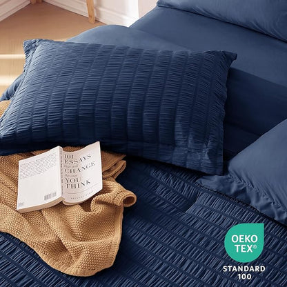 MUXHOMO 7 Pieces California King Comforter Set, Seersucker Bed in a Bag Cal King Size, All Season Luxury Bedding Set with Comforter, Flat Sheet, Fitted Sheet, Pillowcases & Shams, Navy Blue