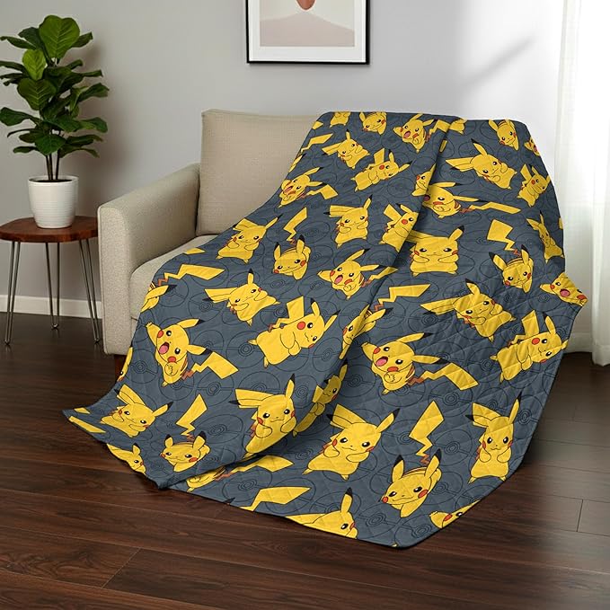 Northwest Pokemon Company Reversible Twin Quilted Blanket - Pikachu & Pokeball Pattern for Anime Fans, Cozy Blanket for Bed, Game Room or Couch, 60x90 inches