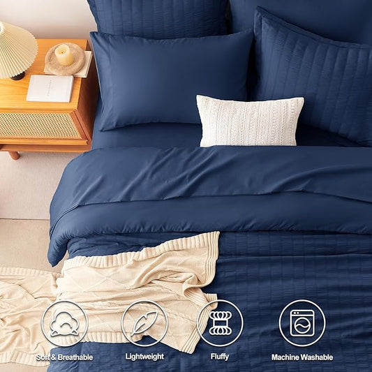 CozyLux Oversized King Comforter Set Navy Blue Seersucker 7 Pieces 120x98 Bed in a Bag Comforter Set with Sheets, Luxury Soft Bedding Sets with Down Alternative Comforter, Sheets, Pillowcases & Shams