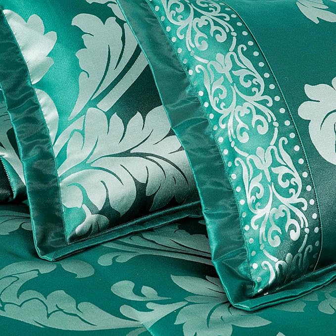 Teal fabric with white floral pattern and decorative border