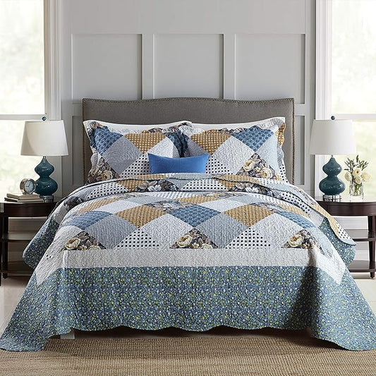 Quilted bedspread with geometric pattern on a bed in a bedroom setting.