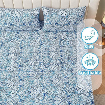 Blue and white patterned bedding set with 'Soft' and 'Breathable' icons on a bed.