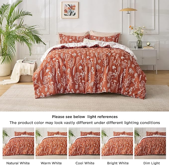 Bedding set with floral pattern in a bedroom setting, featuring light references for color accuracy.