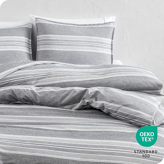 Gray striped bedding set with pillows on a white background, featuring the OEKO-TEX logo.