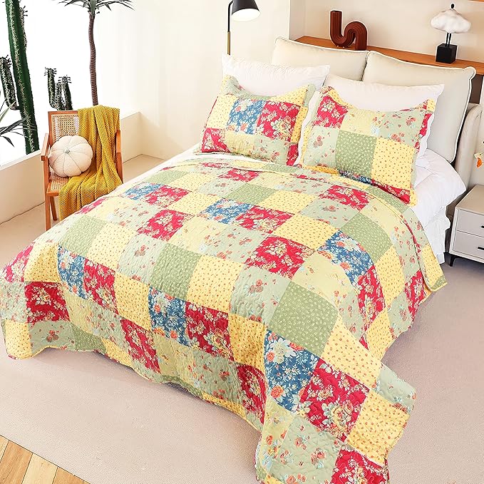 Colorful patchwork quilt on a bed in a bedroom setting